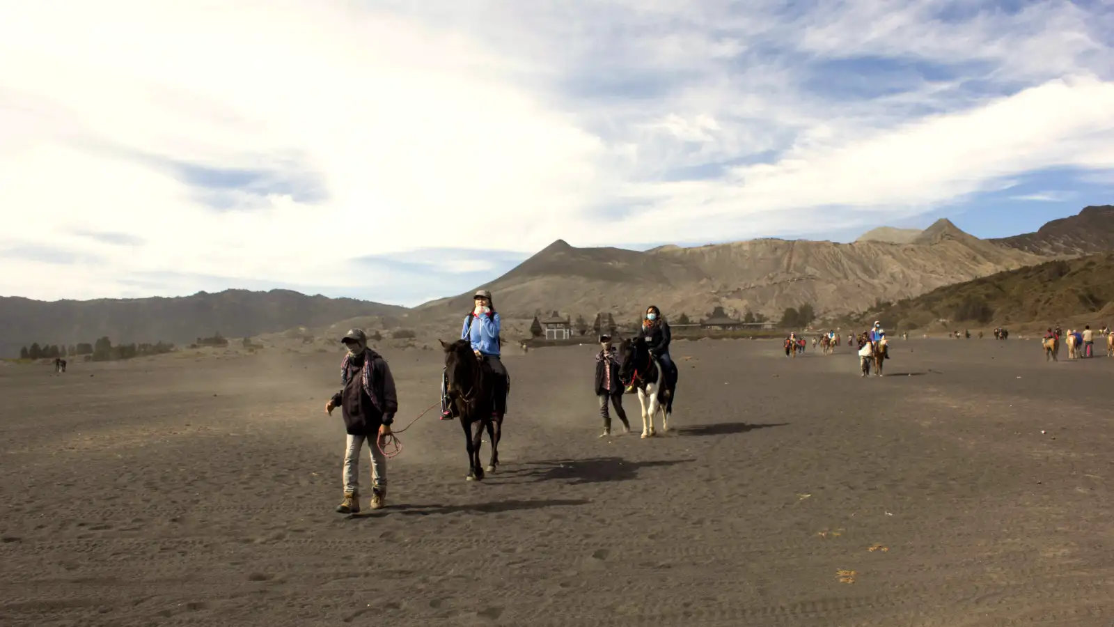 A 4x4 Jeep driving through the Sea of Sand near Mount Bromo