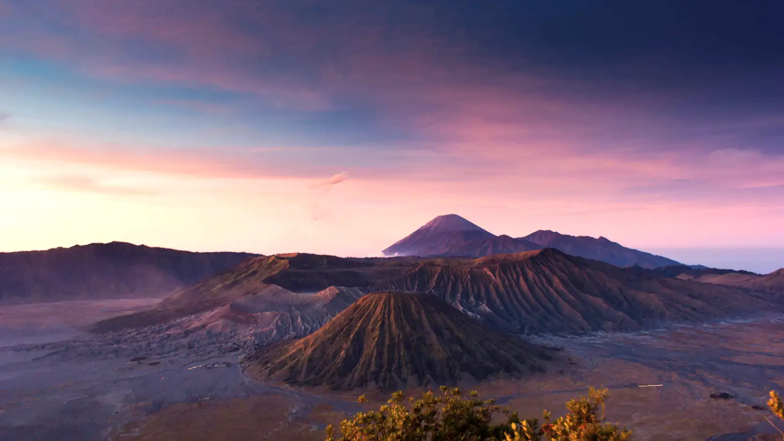 Spectacular golden sunrise view from Mount Penanjakan viewpoint over Bromo Tengger Semeru National Park